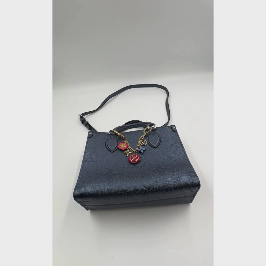 Louis Vuitton Metallic Empreinte Monogram Giant Onthego PM Navy Nacre