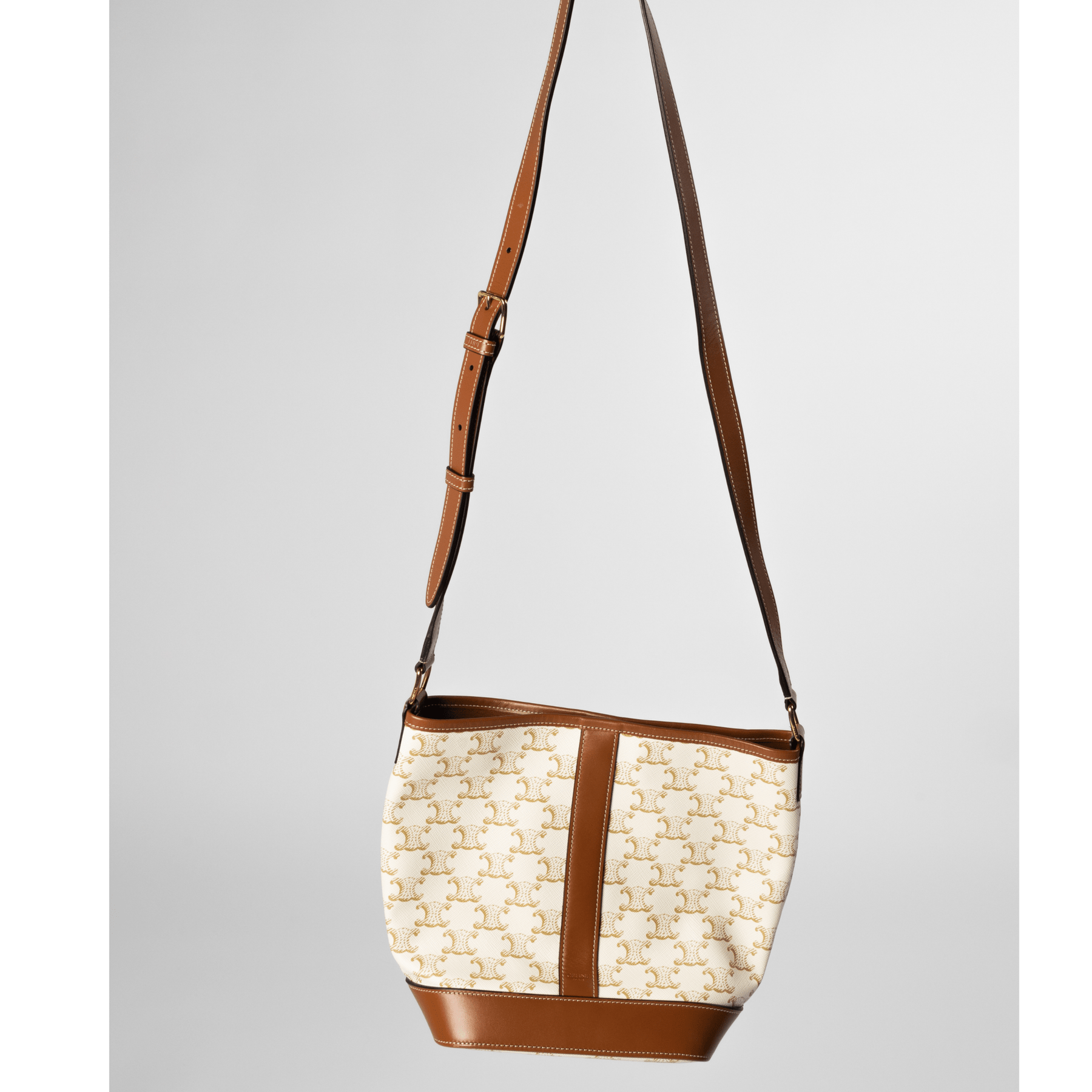 CELINE SMALL BUCKET IN TRIOMPHE CANVAS AND CALFSKIN TAN